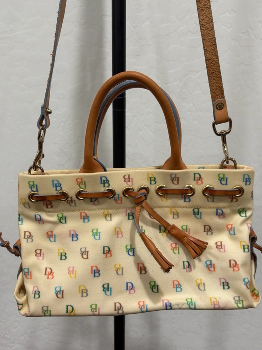 Vintage Dooney & Bourke cream signature rainbow logo